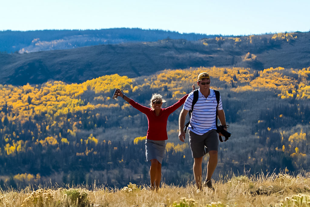 Hikers at C Lazy U Ranch reach the top of a hill