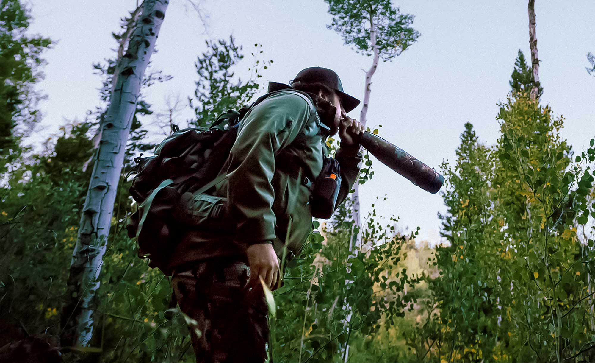 A hunter calling for a bull elk